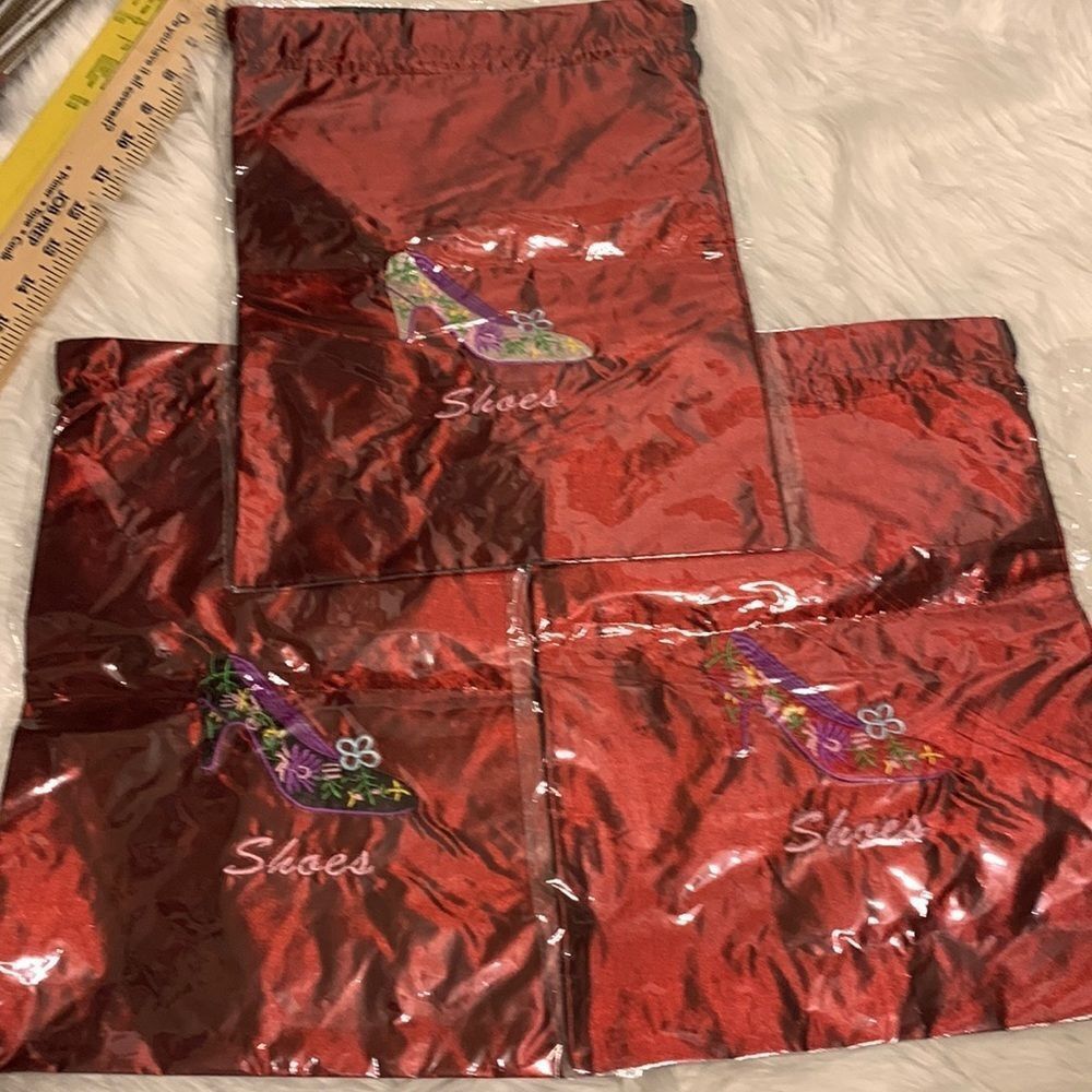 Package of three wine color shoe and/or lingerie drawstring bags
